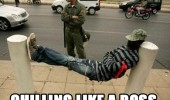 man lying between two posts street chilling like a boss funny pics pictures pic picture image photo images photos lol