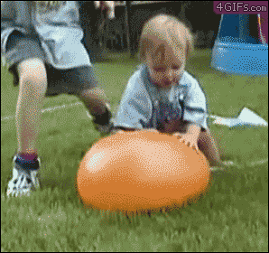 funny-kid-baby-boy-bursting-water-balloon-animated-gif-pics.gif