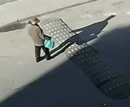 funny-pictures-drunk-man-falling-speed-bump.gif